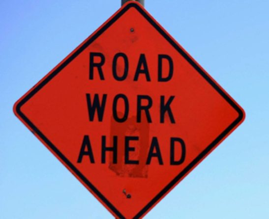 picture of road sign that says road work ahead.